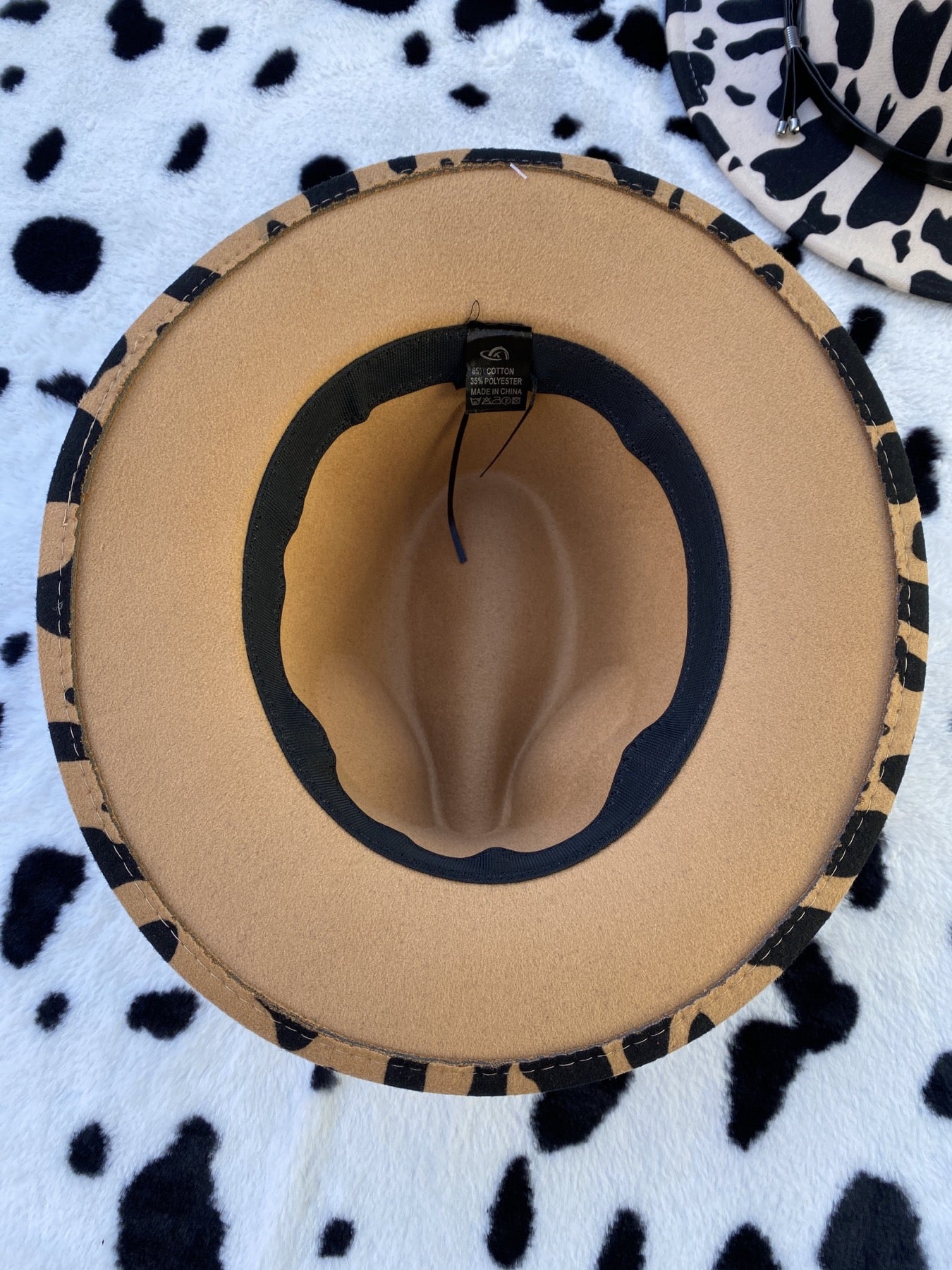 COW PRINT BRIMMED HAT